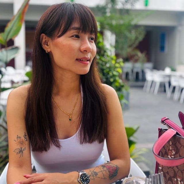 Portrait of Sumi Limbu, co-founder and salon director of Hair Official